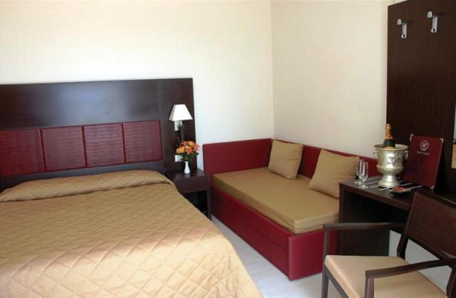 Hotel Capitol San Mauro Mare Номер фото